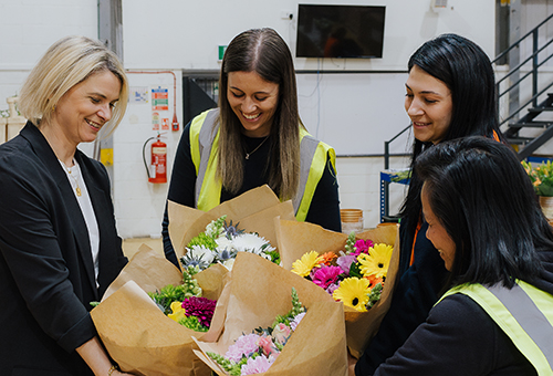 Simply Thank You staff receiving flowers