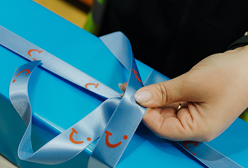 Simply Thank You staff reward gift wrapped in Tui branding