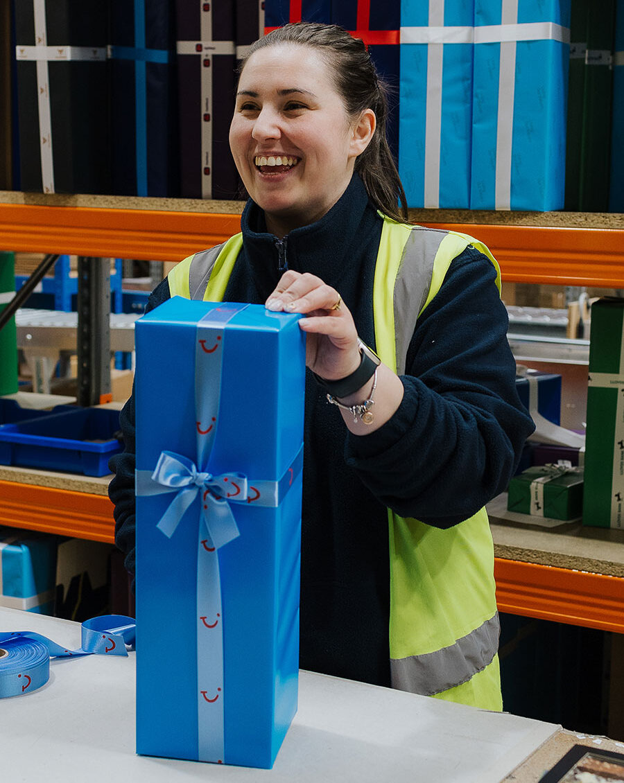 Simply Thank You - Gifting Fulfilment and Delivery staff demonstrating the TUI branded gift box with ribbon.